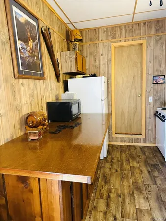 a bedroom with a bed and a table