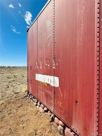 a view of a dry yard with mountain