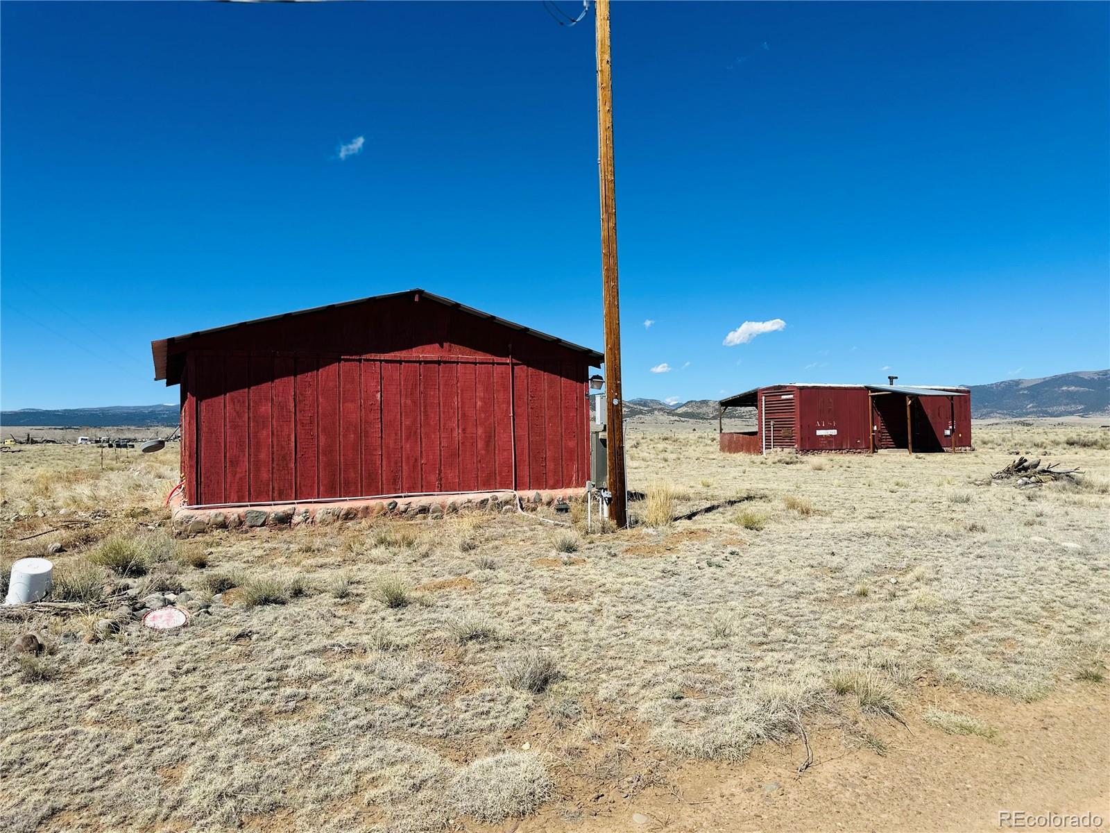 0 County Road La Jara, CO 81140 - Photo 3 of 26 a view of a wooden fence under a large tree