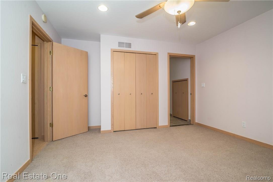 8519 Tindall Road Davisburg, MI 48350 - Photo 29 of 41 Large, clean second bedroom. Neutral colors to accomodate your personal style.