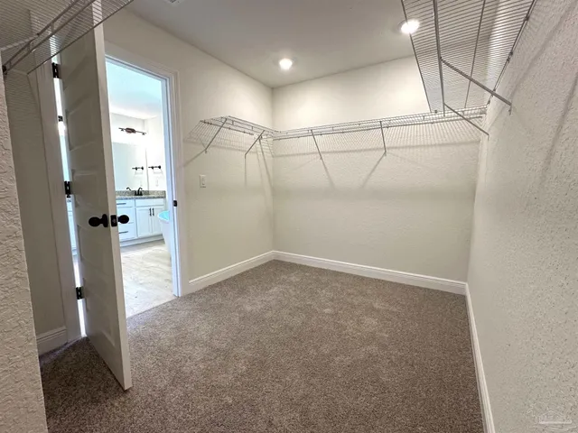 a view of a room with an empty space