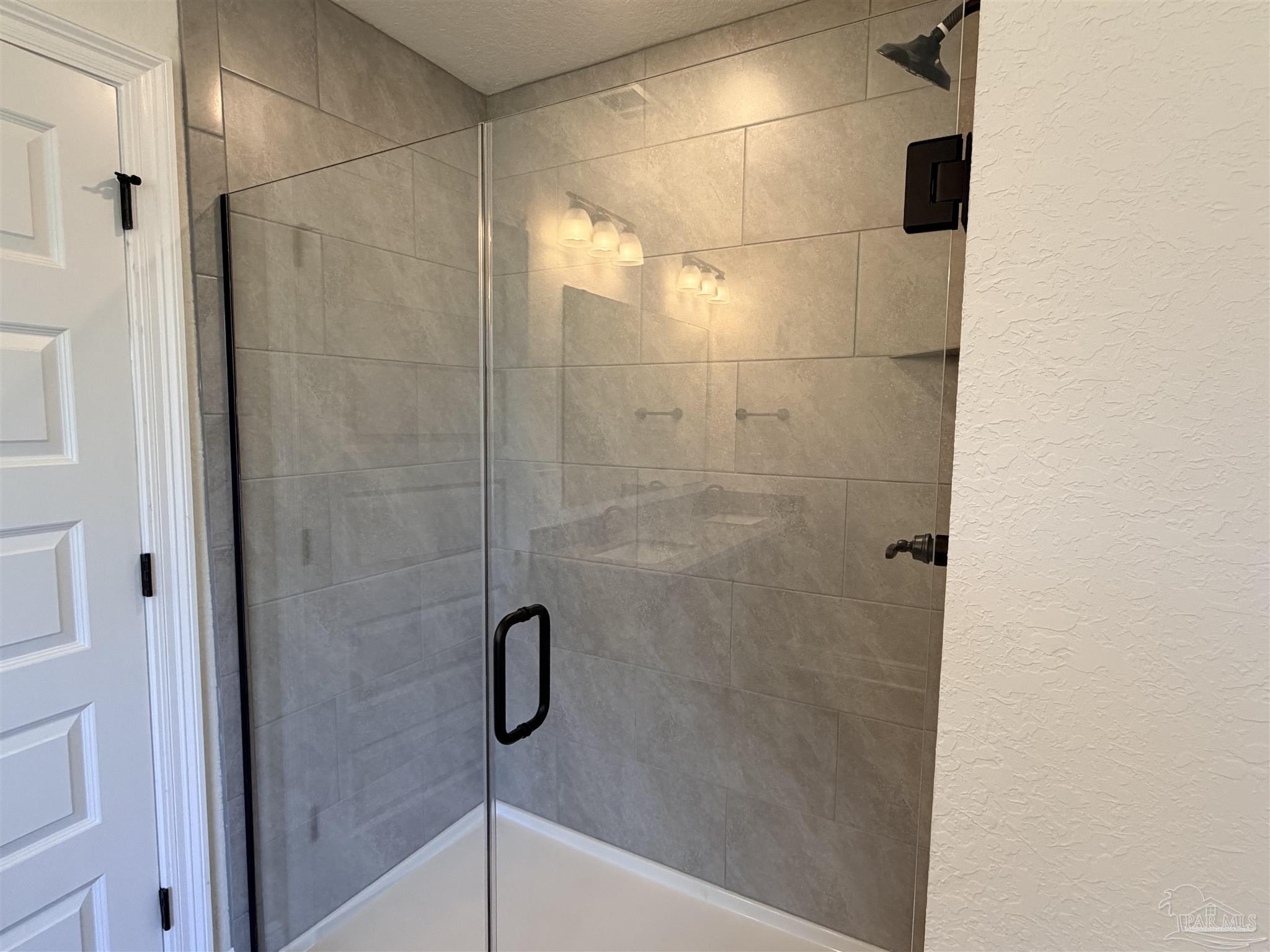 5263 Wahoo Road Milton, FL 32583 - Photo 15 of 25 a bathroom with a shower