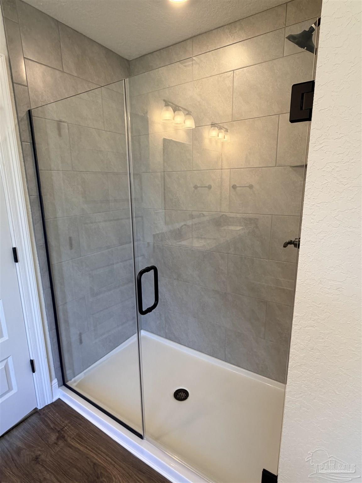 5263 Wahoo Road Milton, FL 32583 - Photo 16 of 25 a bathroom with a shower