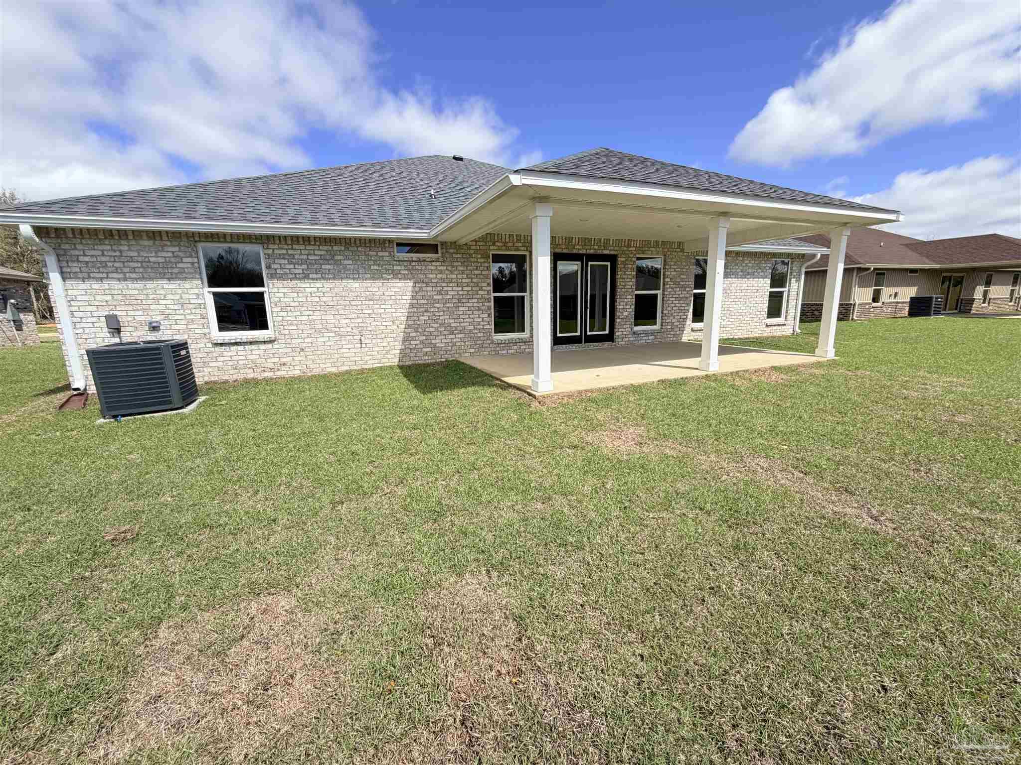 5263 Wahoo Road Milton, FL 32583 - Photo 24 of 25 front view of a house with a yard