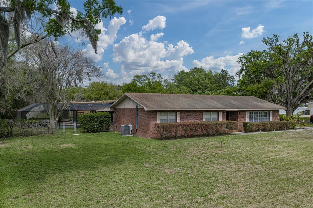 609 West Pipkin Road Lakeland, FL 33813 - Photo 67 of 72 a view of a house with a yard