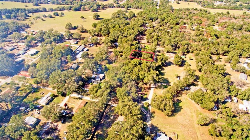 Arial view of the lot and surrounding properties.
