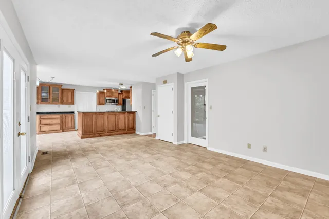 a view of a bedroom with closet and cabinet