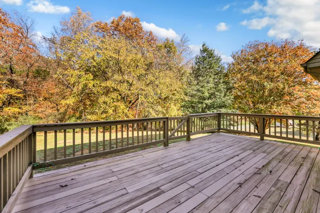 a view of wooden balcony with outdoor space