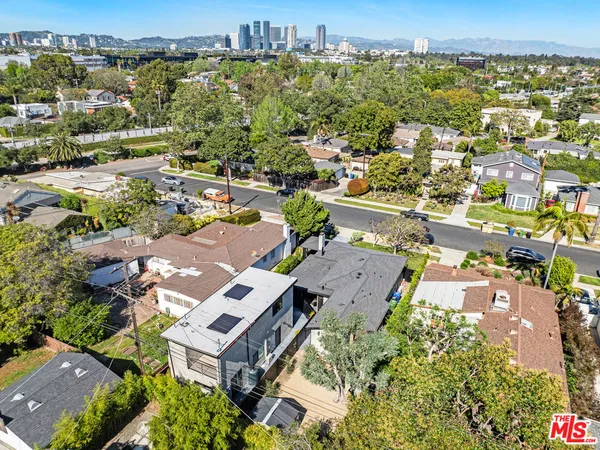 an aerial view of a city with lots of residential buildings