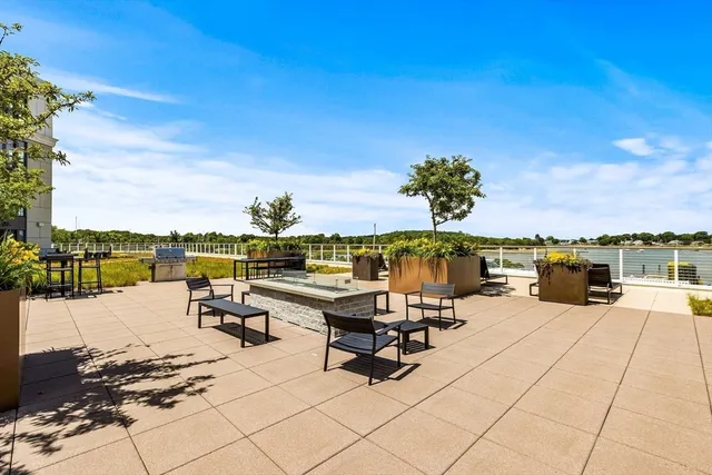 a view of a terrace with chairs