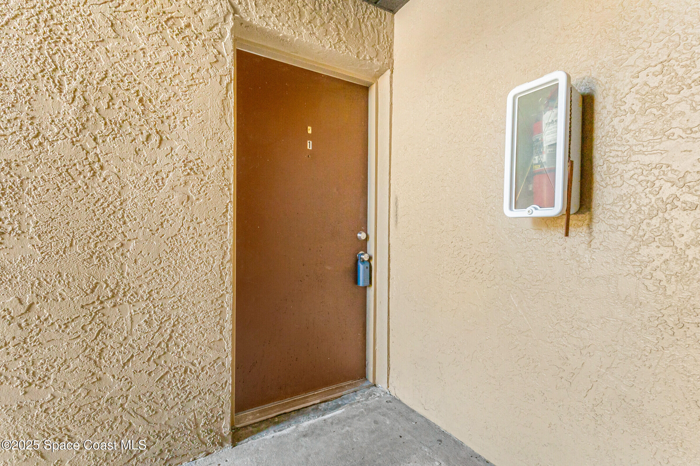 265 Spring Drive, Unit 1 Merritt Island, FL 32953 - Photo 2 of 40 29_265Spring221_mls