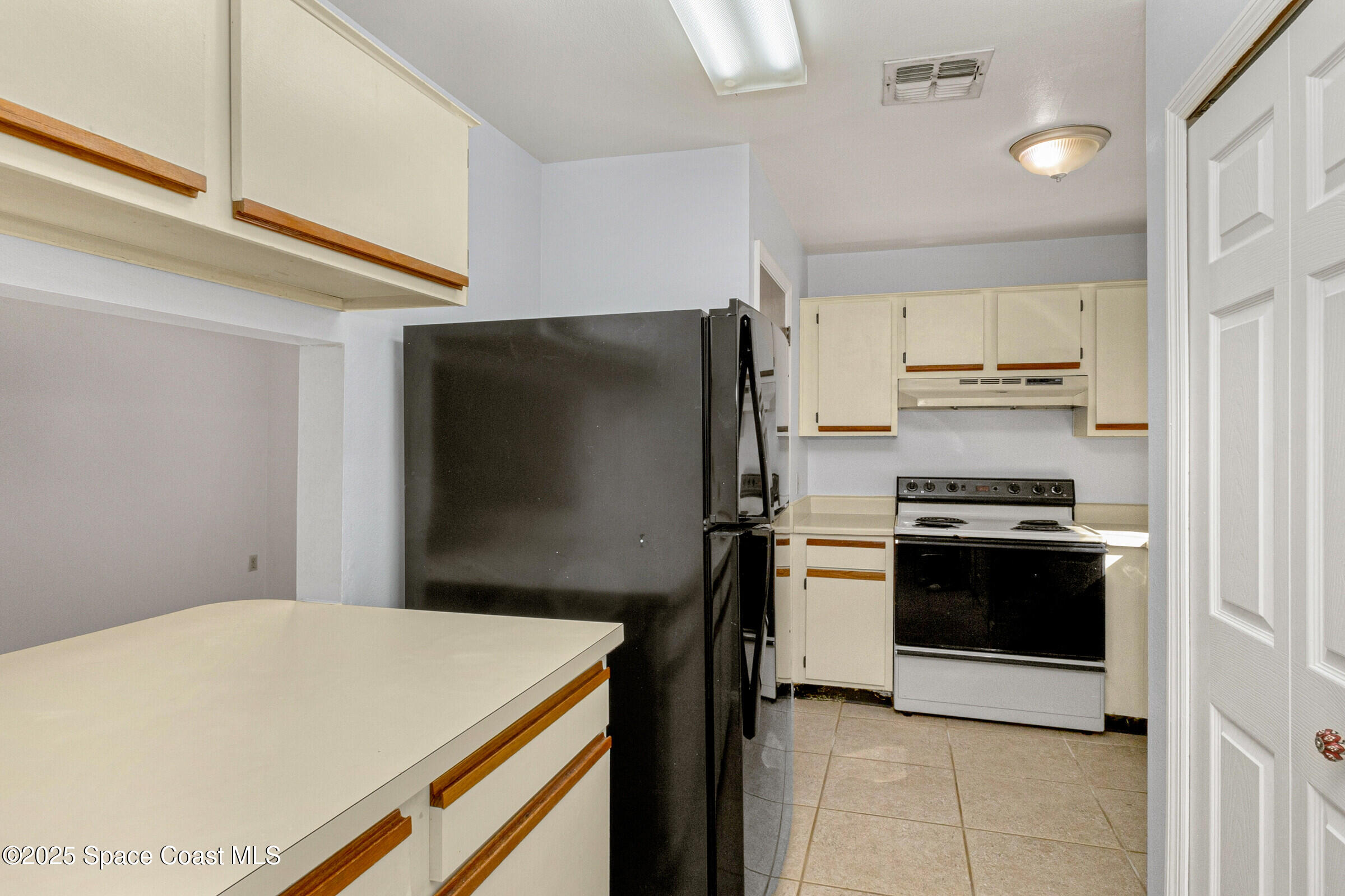 265 Spring Drive, Unit 1 Merritt Island, FL 32953 - Photo 4 of 40 23_265Spring215_mls