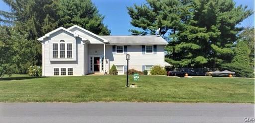 1415 Thomas Drive Coplay, PA 18037 - Photo 1 of 32 a front view of a house with a yard