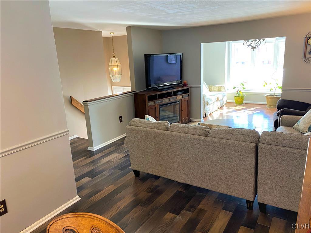 1415 Thomas Drive Coplay, PA 18037 - Photo 11 of 32 a living room with furniture and a flat screen tv