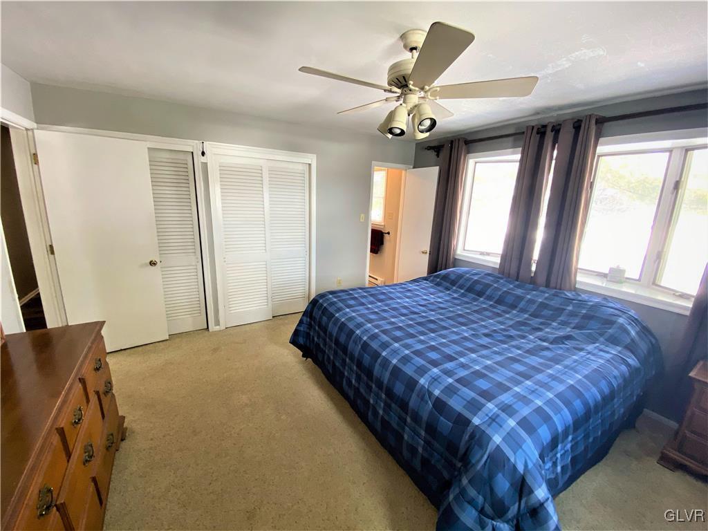 1415 Thomas Drive Coplay, PA 18037 - Photo 12 of 32 a bedroom with a large bed and a window