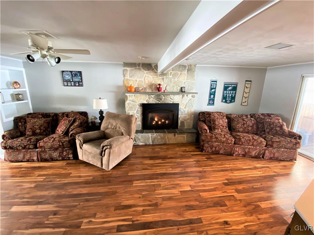 1415 Thomas Drive Coplay, PA 18037 - Photo 21 of 32 a living room with furniture and a fireplace