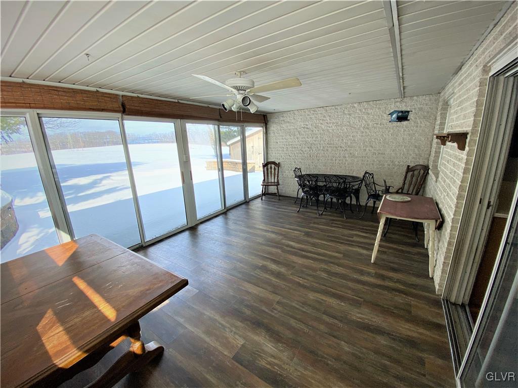 1415 Thomas Drive Coplay, PA 18037 - Photo 29 of 32 a room with wooden floor and furniture