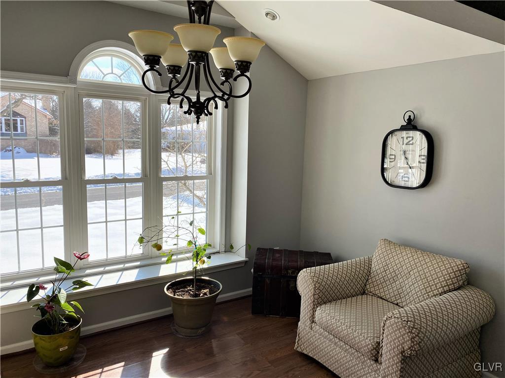 1415 Thomas Drive Coplay, PA 18037 - Photo 6 of 32 a living room with furniture a chandelier and a large window