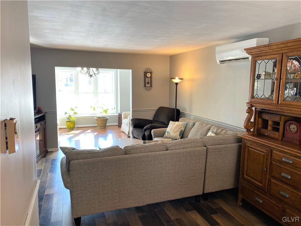 1415 Thomas Drive Coplay, PA 18037 - Photo 10 of 32 a living room with furniture and a window