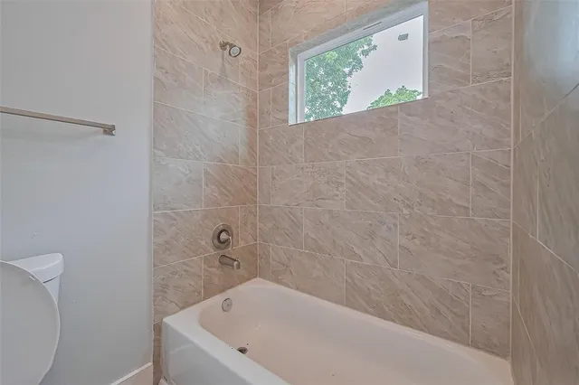 a bathroom with a bathtub