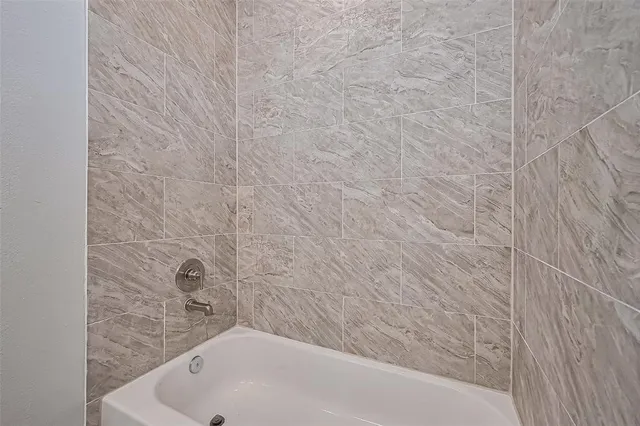 a bathroom with a bathtub