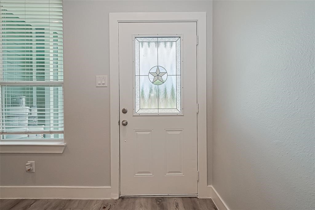 7926 Easter Street Houston, TX 77088 - Photo 5 of 24 a view of an entryway with front door