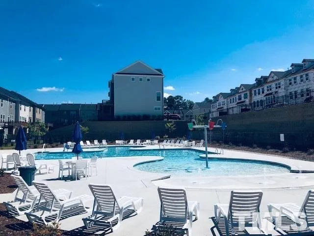 a view of a patio with swimming pool