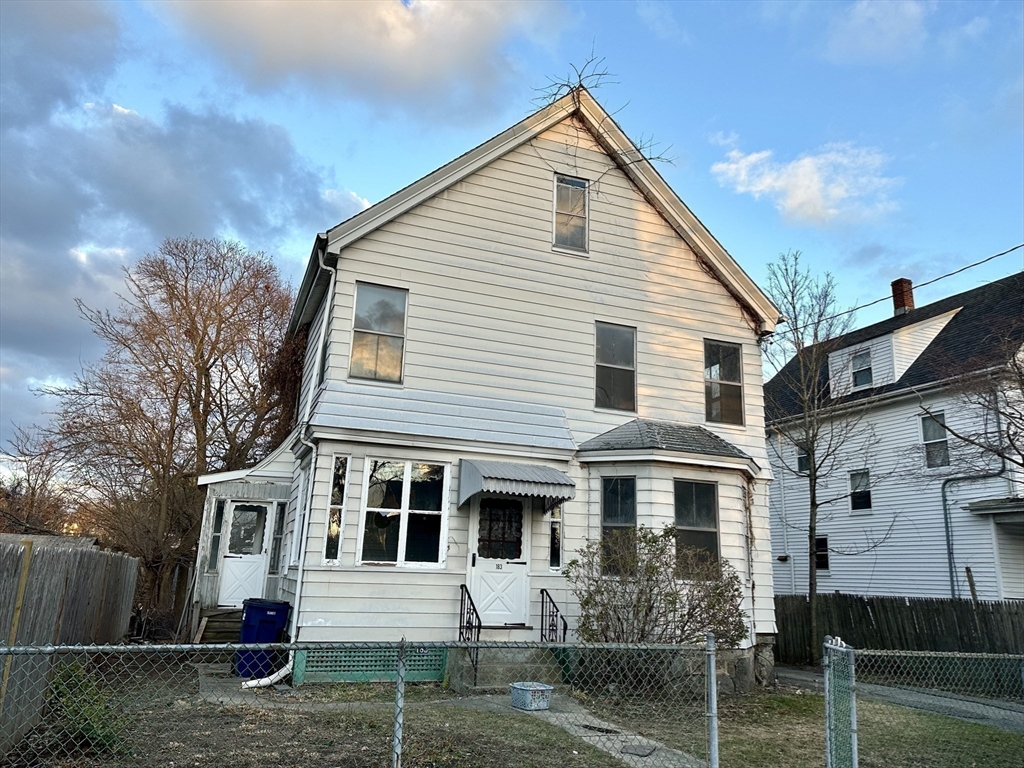 183 Temple Street Boston, MA 02132 - Photo 2 of 15 a view of a yard in front of house