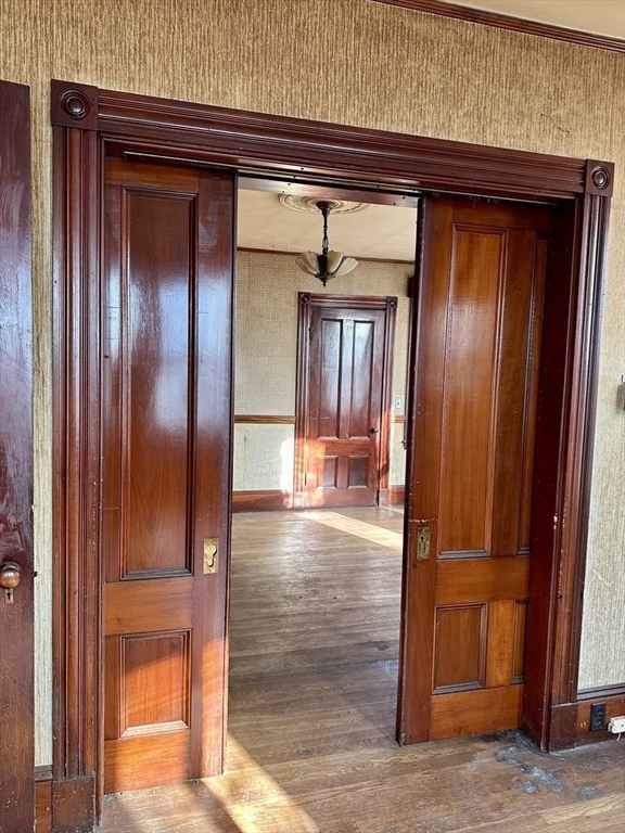 183 Temple Street Boston, MA 02132 - Photo 3 of 15 a view of elevator with hallway