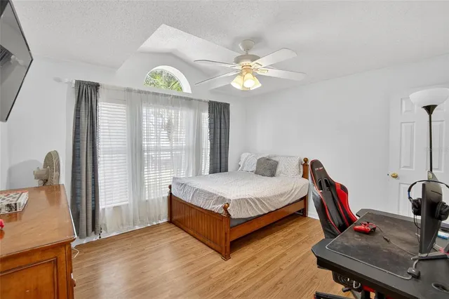 a bathroom with a sink a mirror and a shower