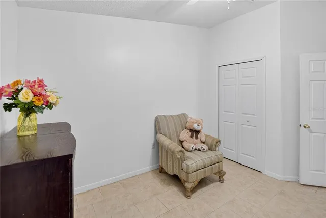 a view of washer and dryer with kitchen in the background