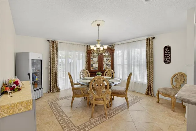 a view of backyard with garden and deck