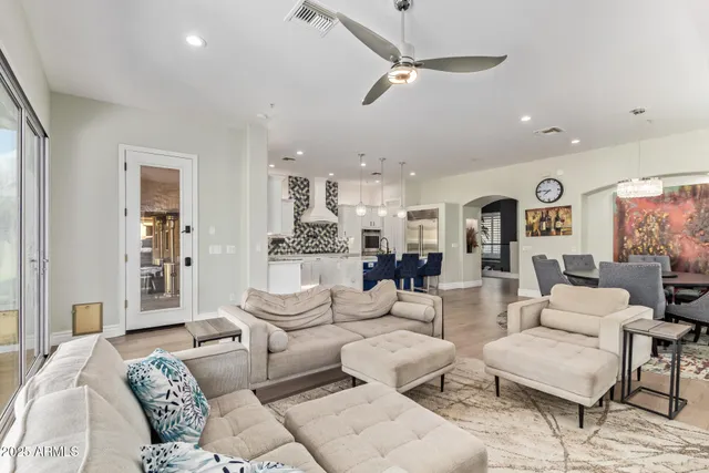 a dining room with furniture and window