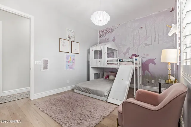 swimming pool view with a sitting space