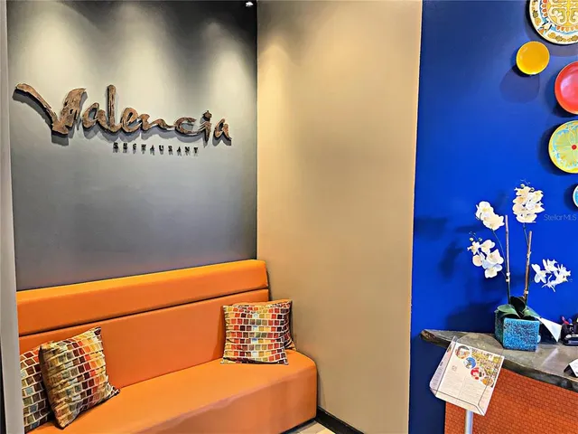 a dining area with chairs and outdoor view