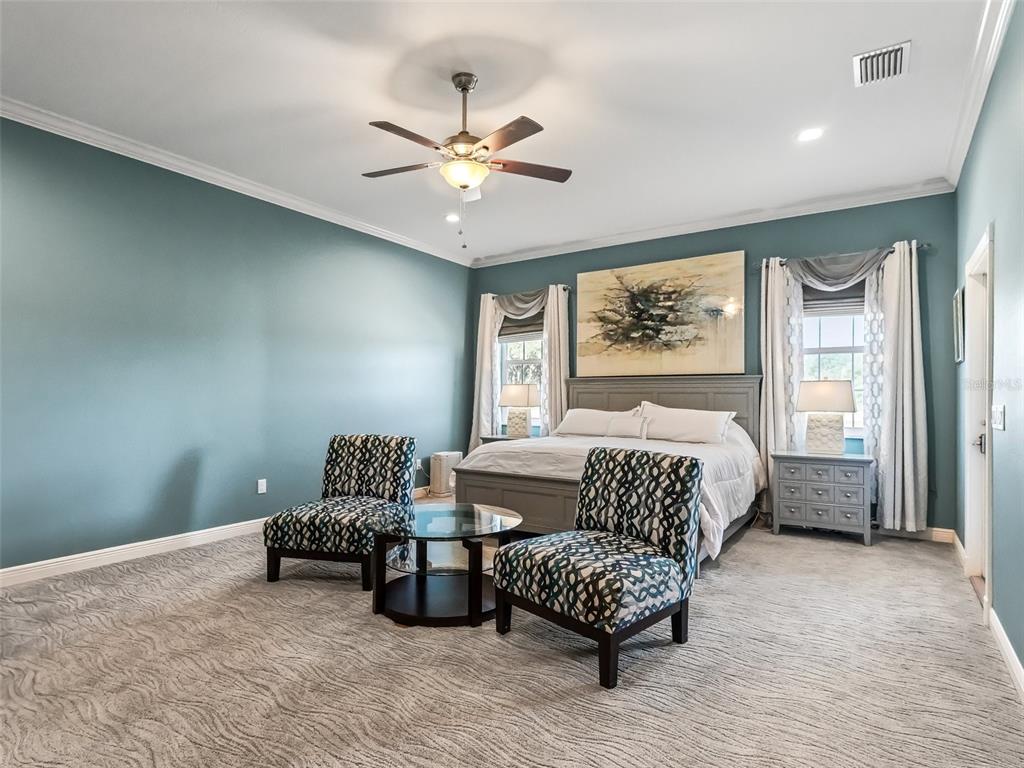 19331 East Levy Street Williston, FL 32696 - Photo 25 of 81 a bedroom with a bed and a couch