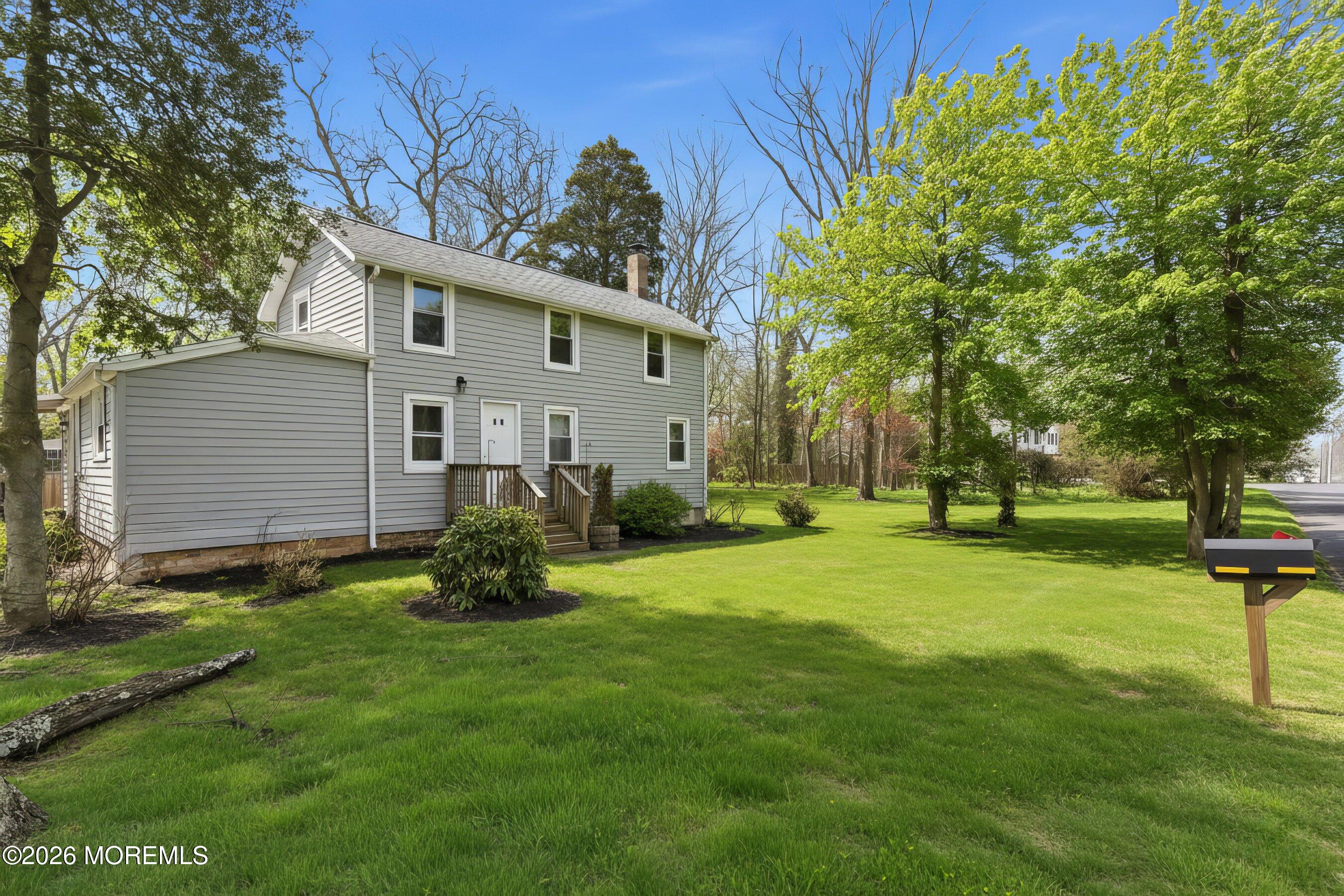 80 Church Road Howell, NJ 07731 - Photo 8 of 31 05-Front Left GRASS