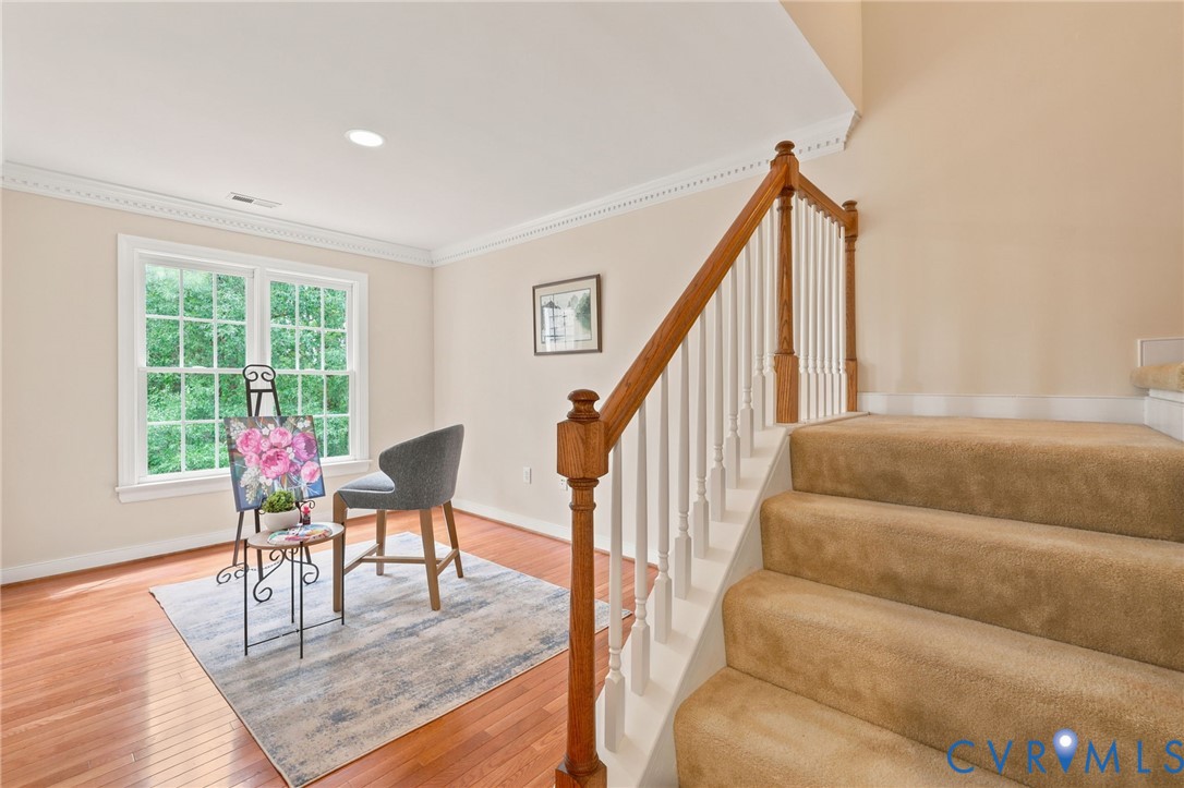 4701 Regal Oaks Road Glen Allen, VA 23059 - Photo 46 of 60 a living room with furniture and a wooden floor