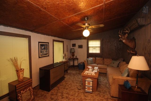 89 Haylee Road Waverly, TN 37185 - Photo 3 of 6 a living room with furniture and a window