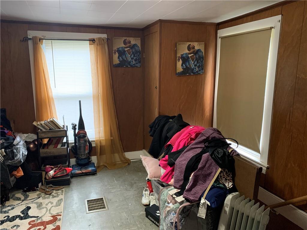511 Virginia Avenue Rochester, PA 15074 - Photo 15 of 19 a living room with furniture and a window