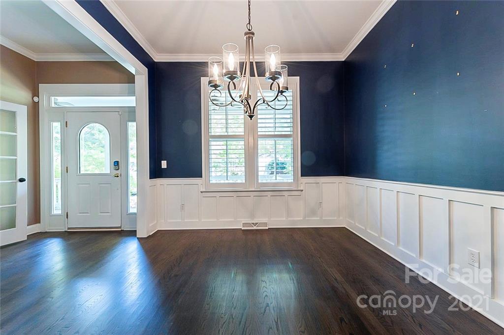 535 Fourth Baxter Crossing Fort Mill, SC 29708 - Photo 11 of 23 a view of an empty room with wooden floor and a window