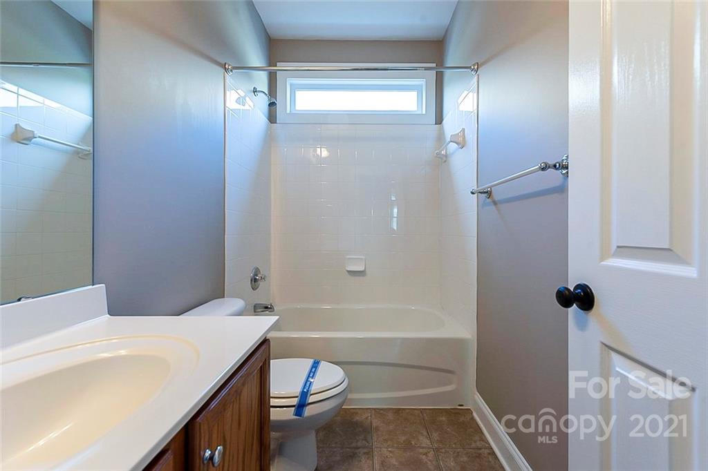 535 Fourth Baxter Crossing Fort Mill, SC 29708 - Photo 16 of 23 a bathroom with a sink a toilet and shower