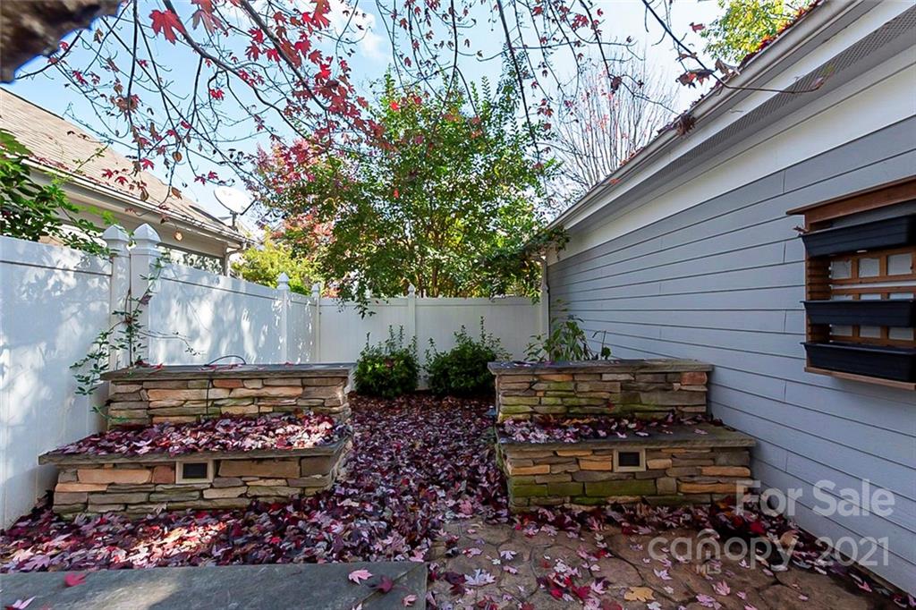535 Fourth Baxter Crossing Fort Mill, SC 29708 - Photo 22 of 23 a view of a wooden bench sitting in backside of a house