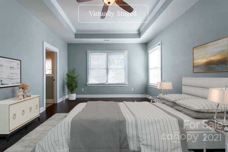 535 Fourth Baxter Crossing Fort Mill, SC 29708 - Photo 3 of 23 a bedroom with a large bed and a large window