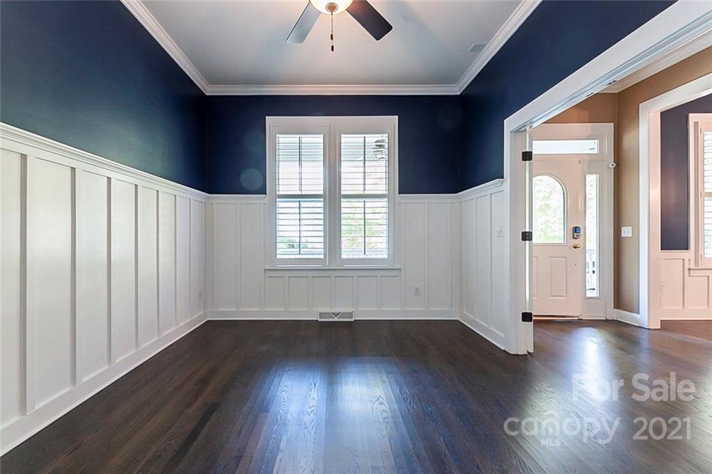 535 Fourth Baxter Crossing Fort Mill, SC 29708 - Photo 10 of 23 an empty room with wooden floor and windows