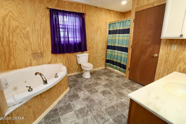 a view of a bathtub in a bathroom