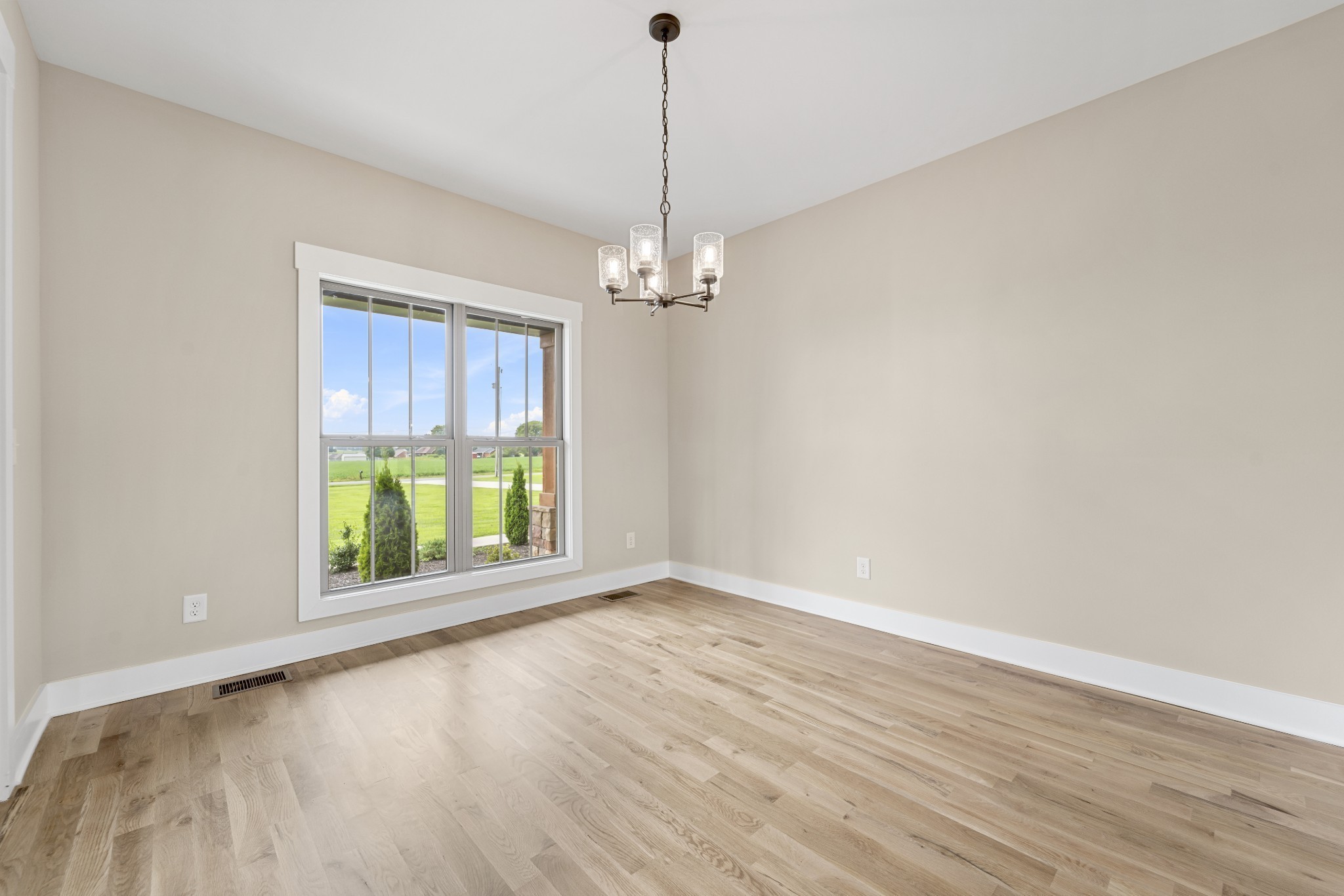 537 Clearview Road Cottontown, TN 37048 - Photo 6 of 15 wooden floor in an empty room with a window