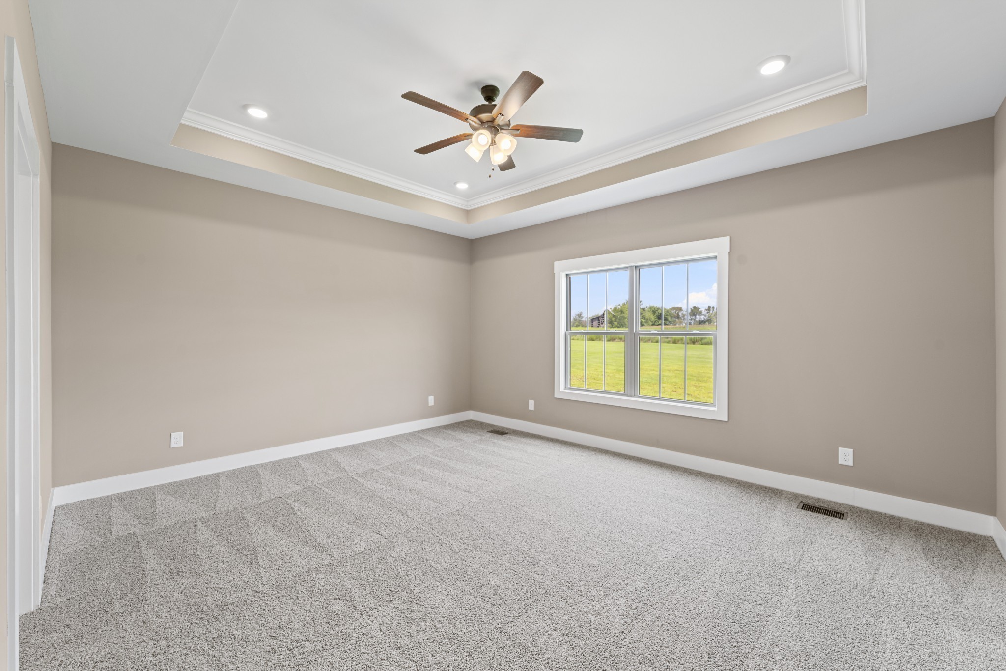 537 Clearview Road Cottontown, TN 37048 - Photo 7 of 15 an empty room with window and ceiling fan