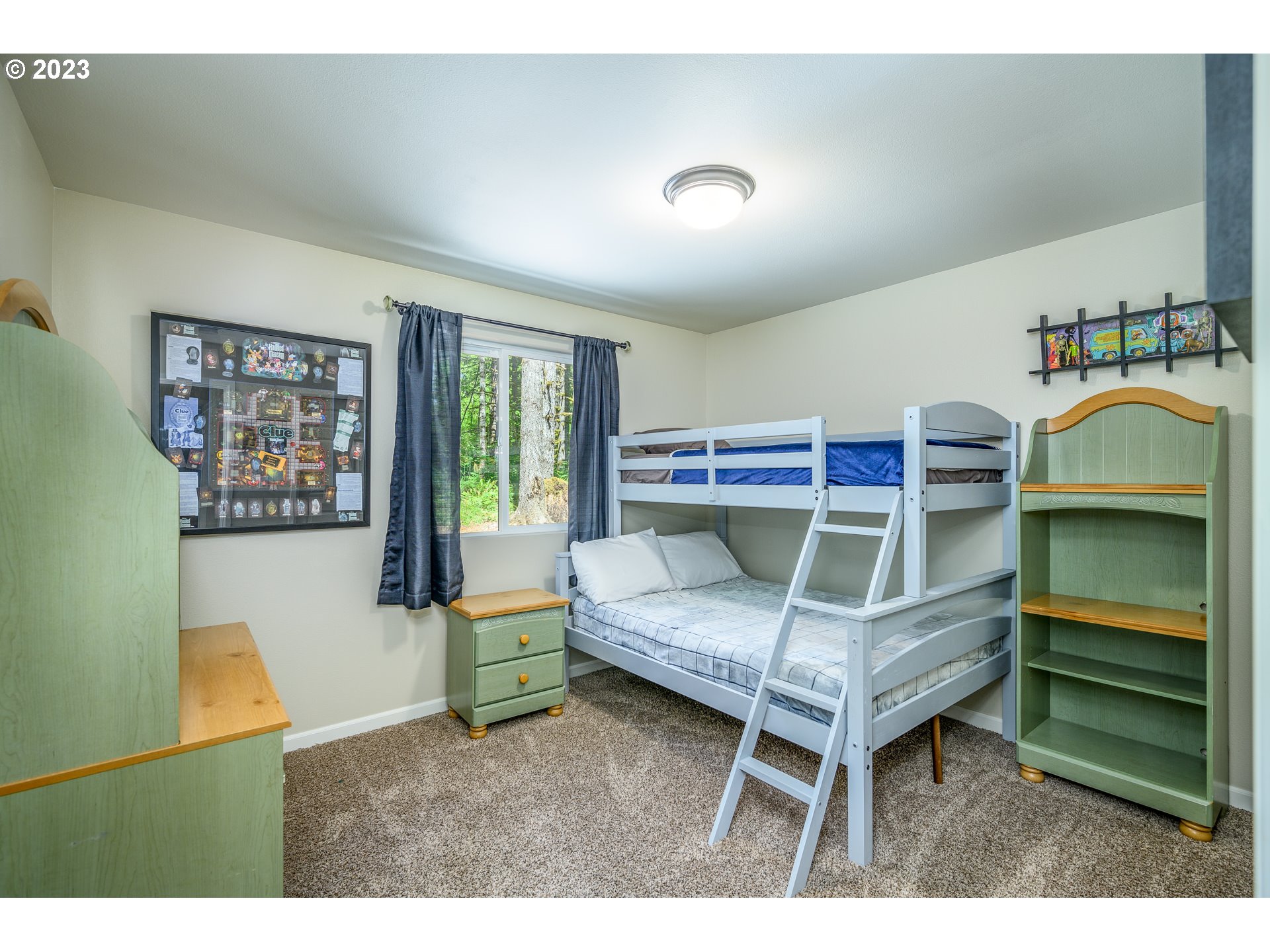 7297 Ash Street Grand Ronde, OR 97347 - Photo 18 of 33 a bedroom with furniture and a window