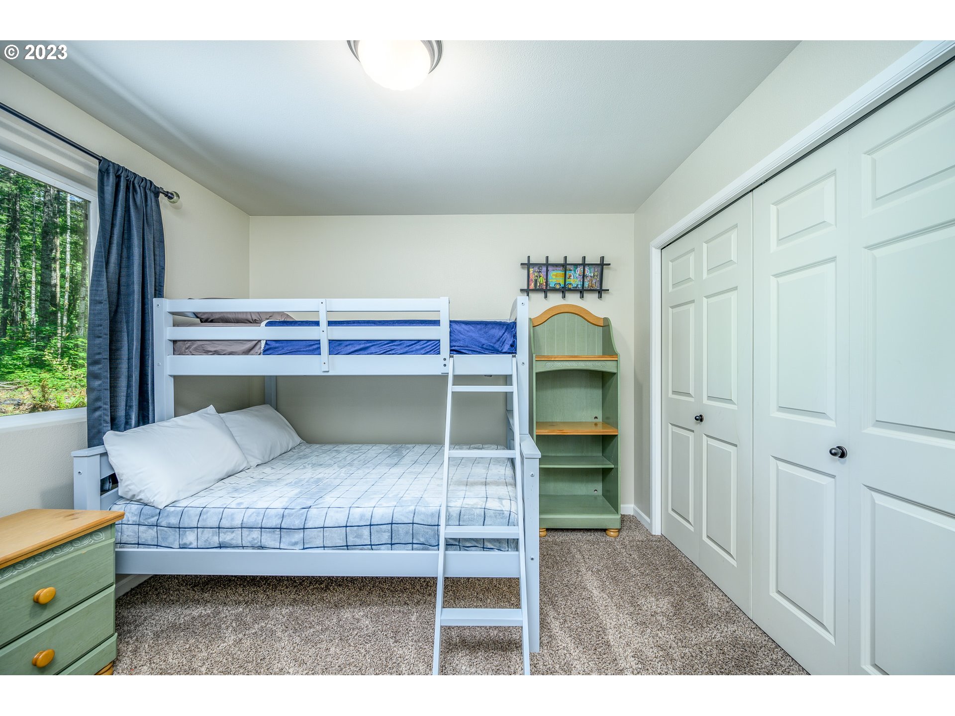 7297 Ash Street Grand Ronde, OR 97347 - Photo 19 of 33 a bedroom with a bed and a window